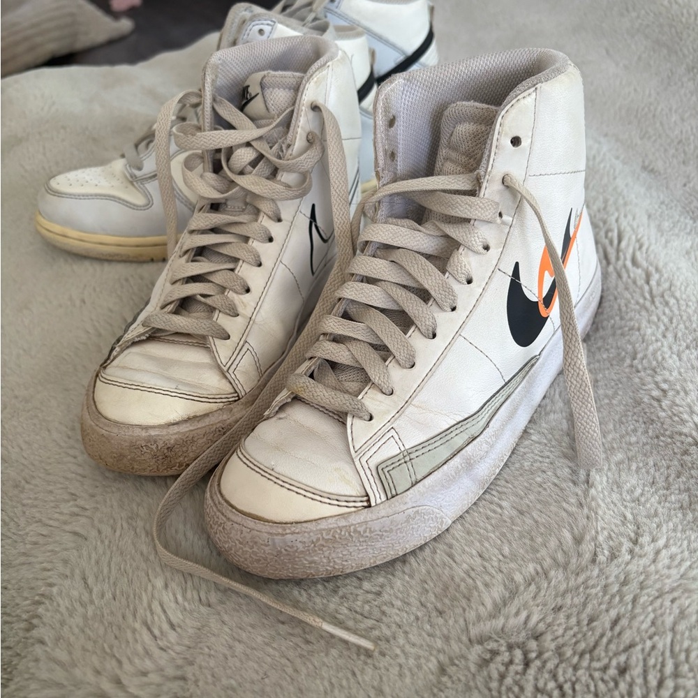 Nike High-Top Sneakers in White and Black with Orange Accents